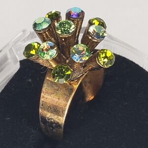 Elegant Gold Ring with Green Accents